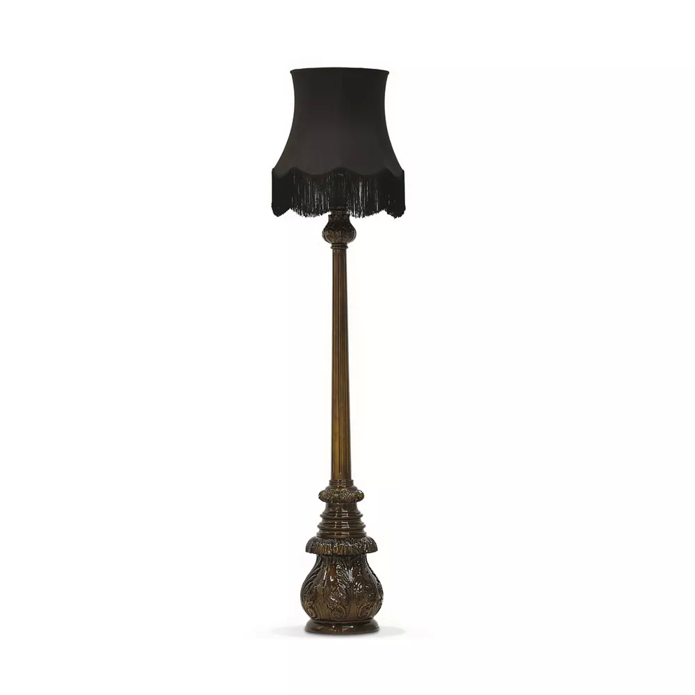 Floor lamp with black fabric lampshade and iridescent green base.